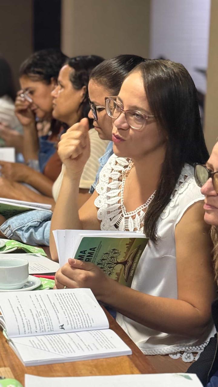 Leitora participando de um encontro com A Alma da Firma